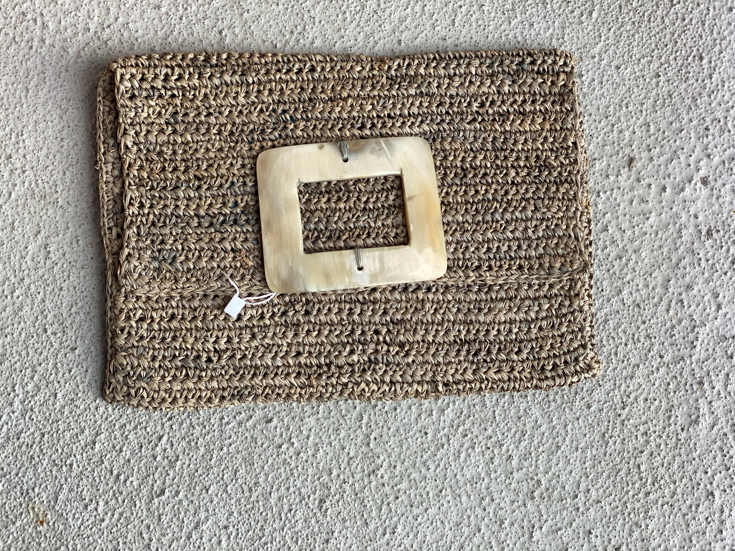 Raffia and Cow Horn Clutches