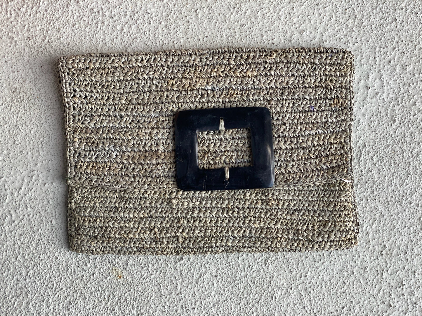 Raffia and Cow Horn Clutches