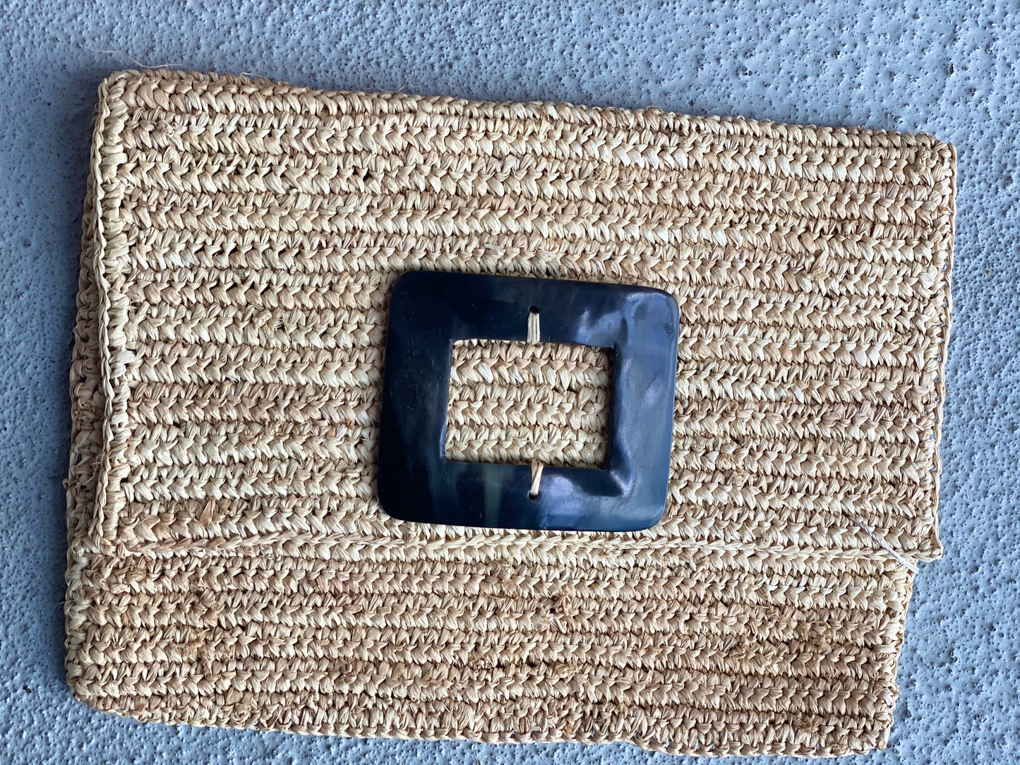 Raffia and Cow Horn Clutches