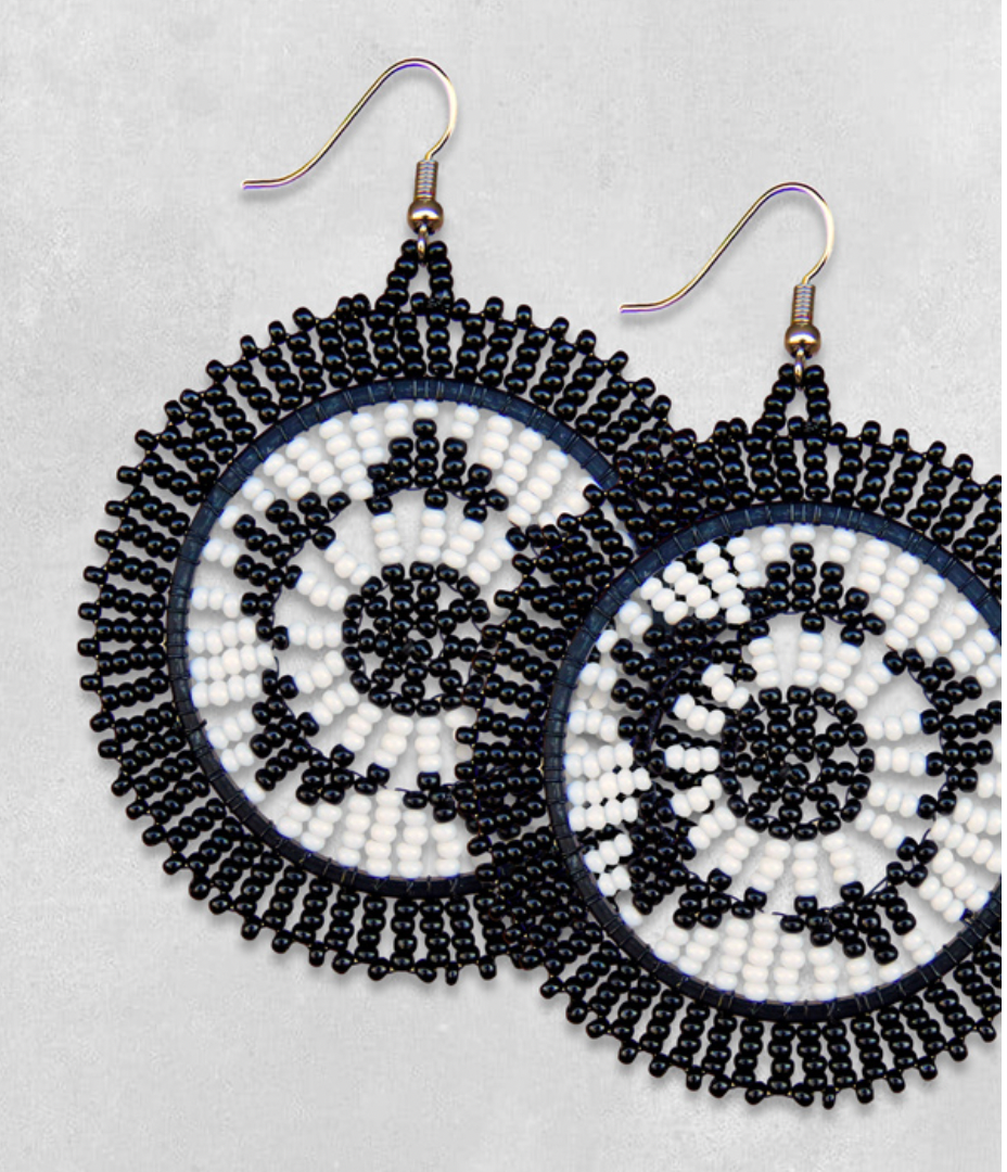 Beaded earrings with black and white pattern.