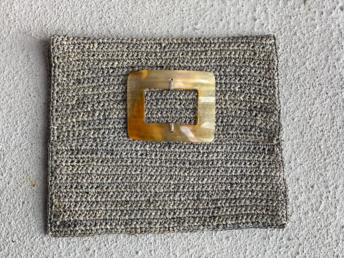 Raffia and Cow Horn Clutches