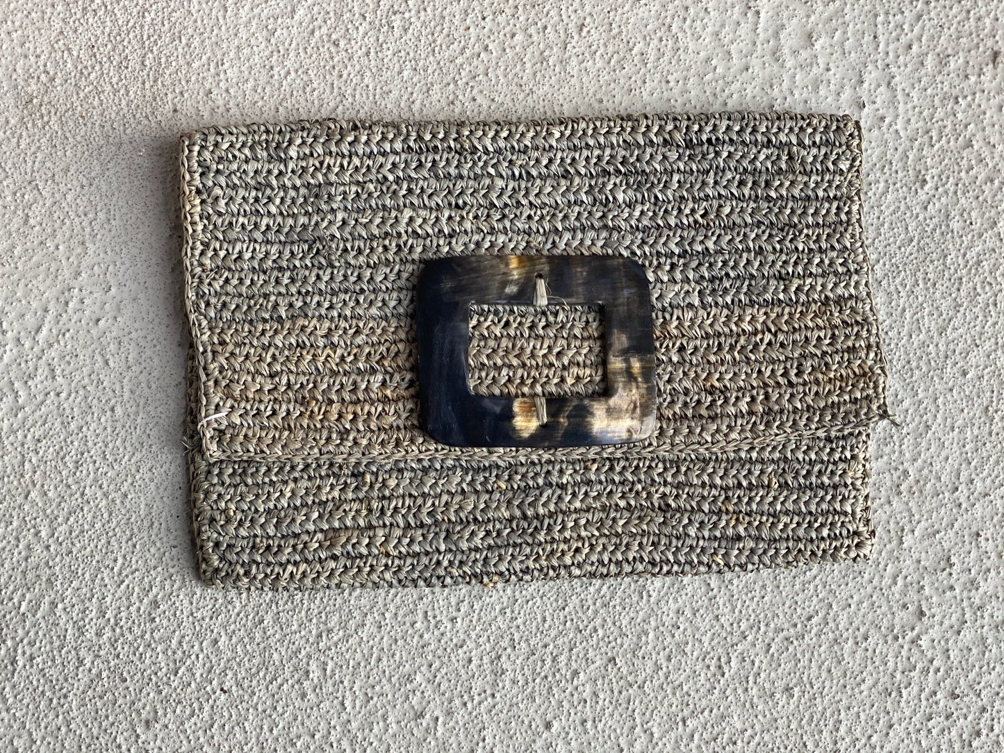 Raffia and Cow Horn Clutches
