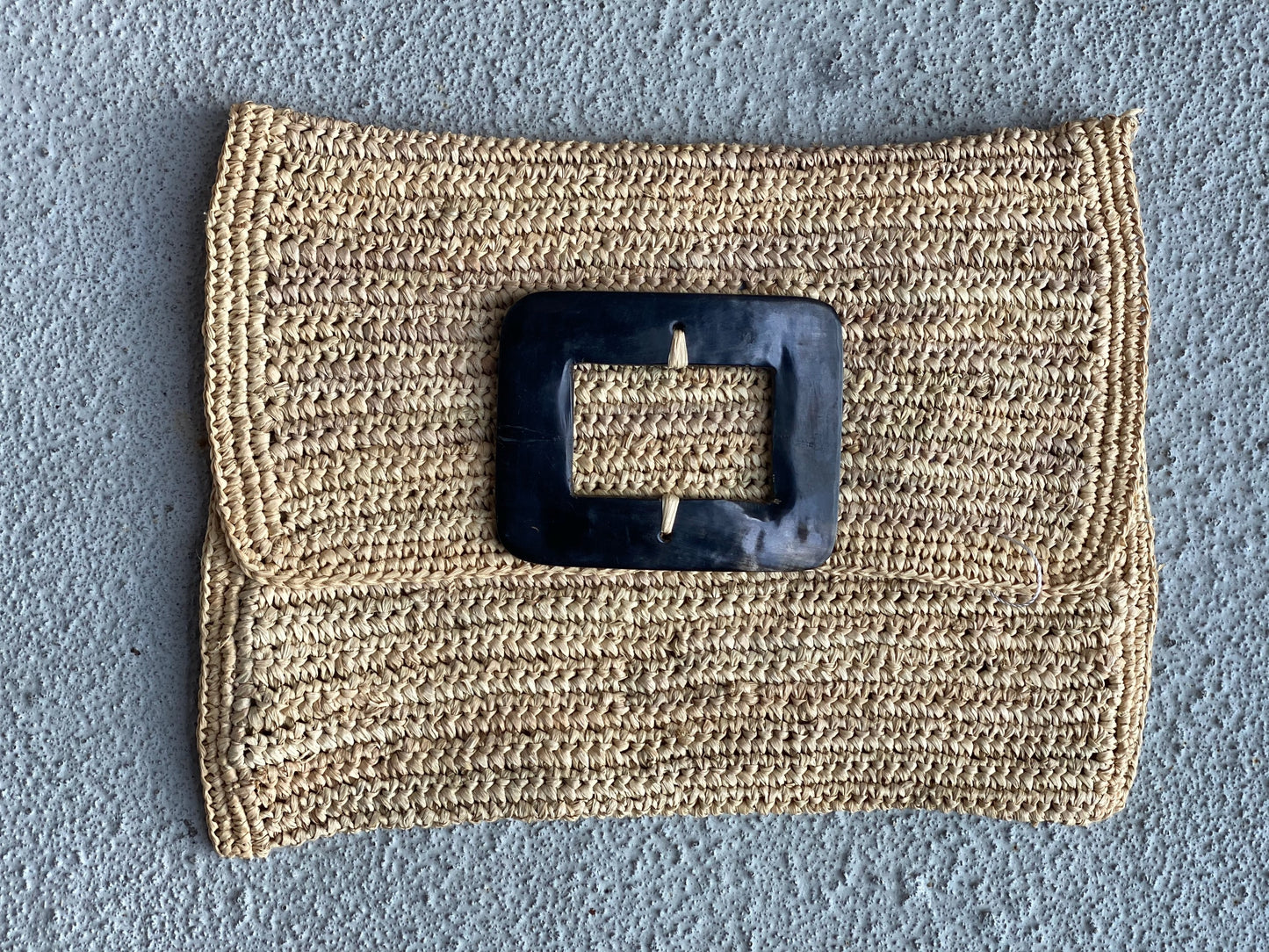 Raffia and Cow Horn Clutches