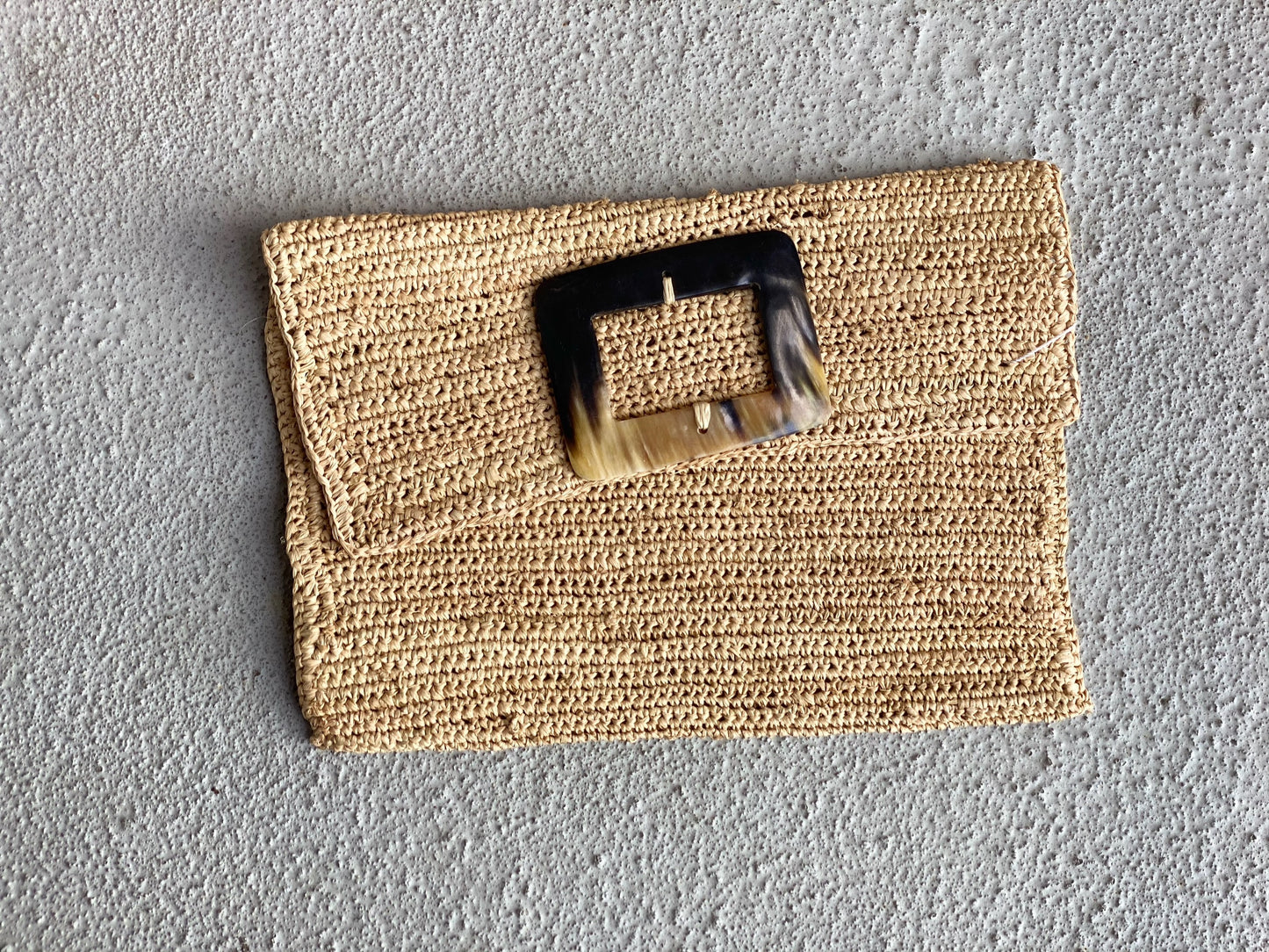 Raffia and Cow Horn Clutches