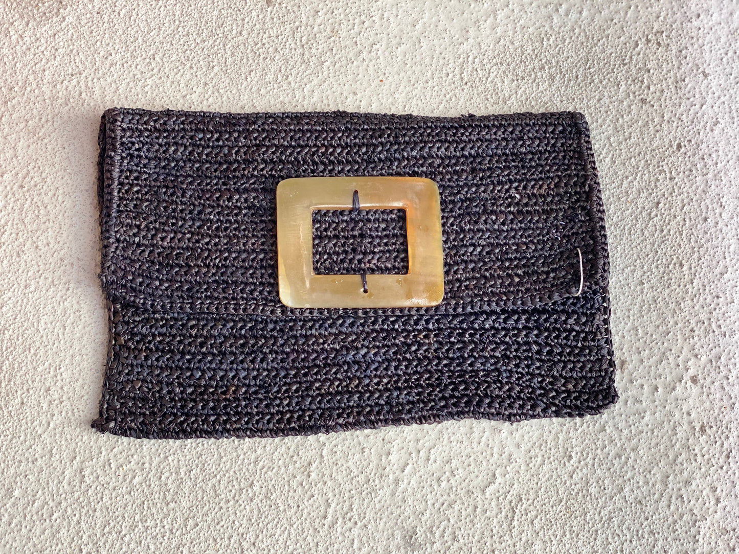 Raffia and Cow Horn Clutches