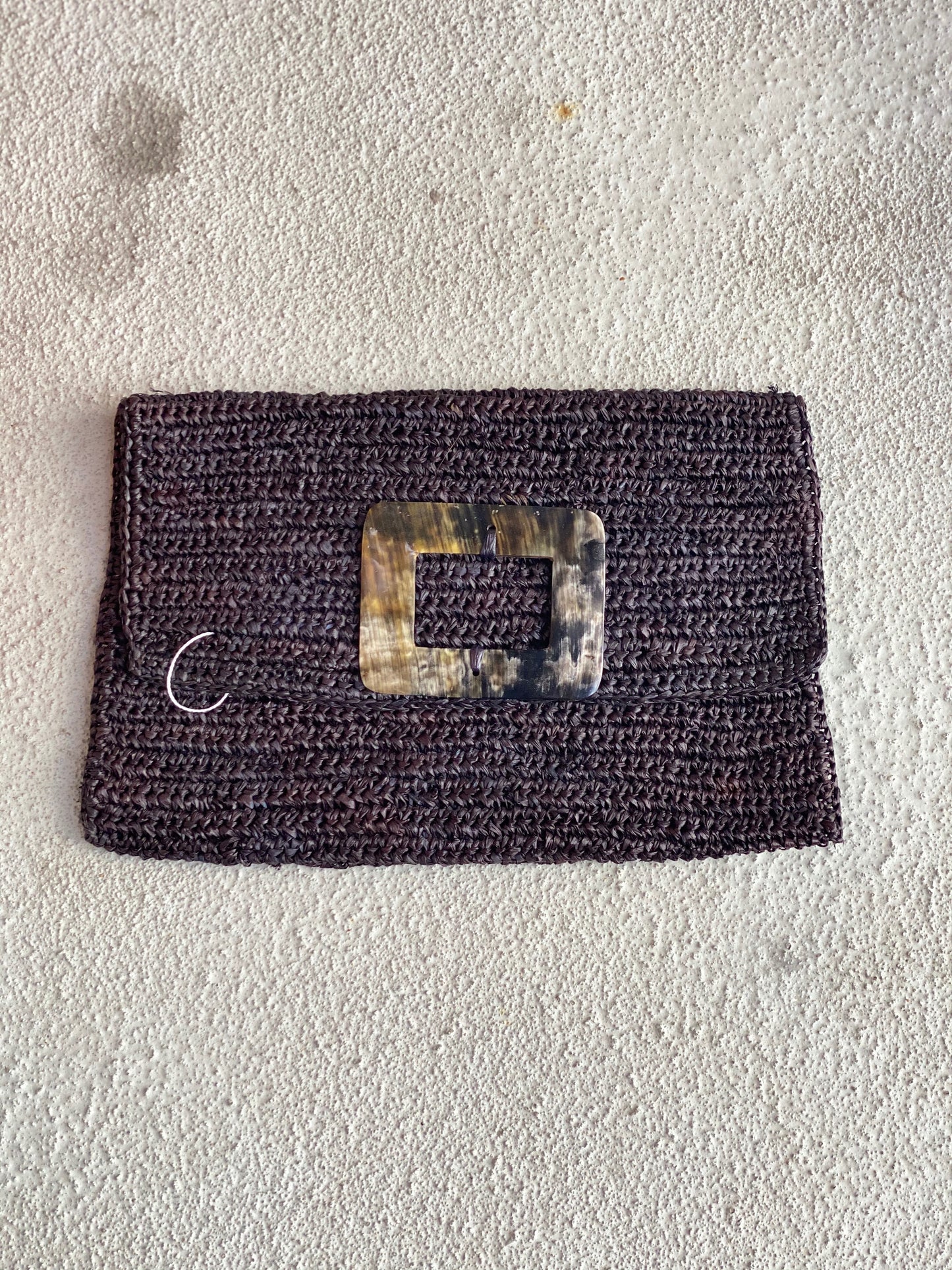 Raffia and Cow Horn Clutches